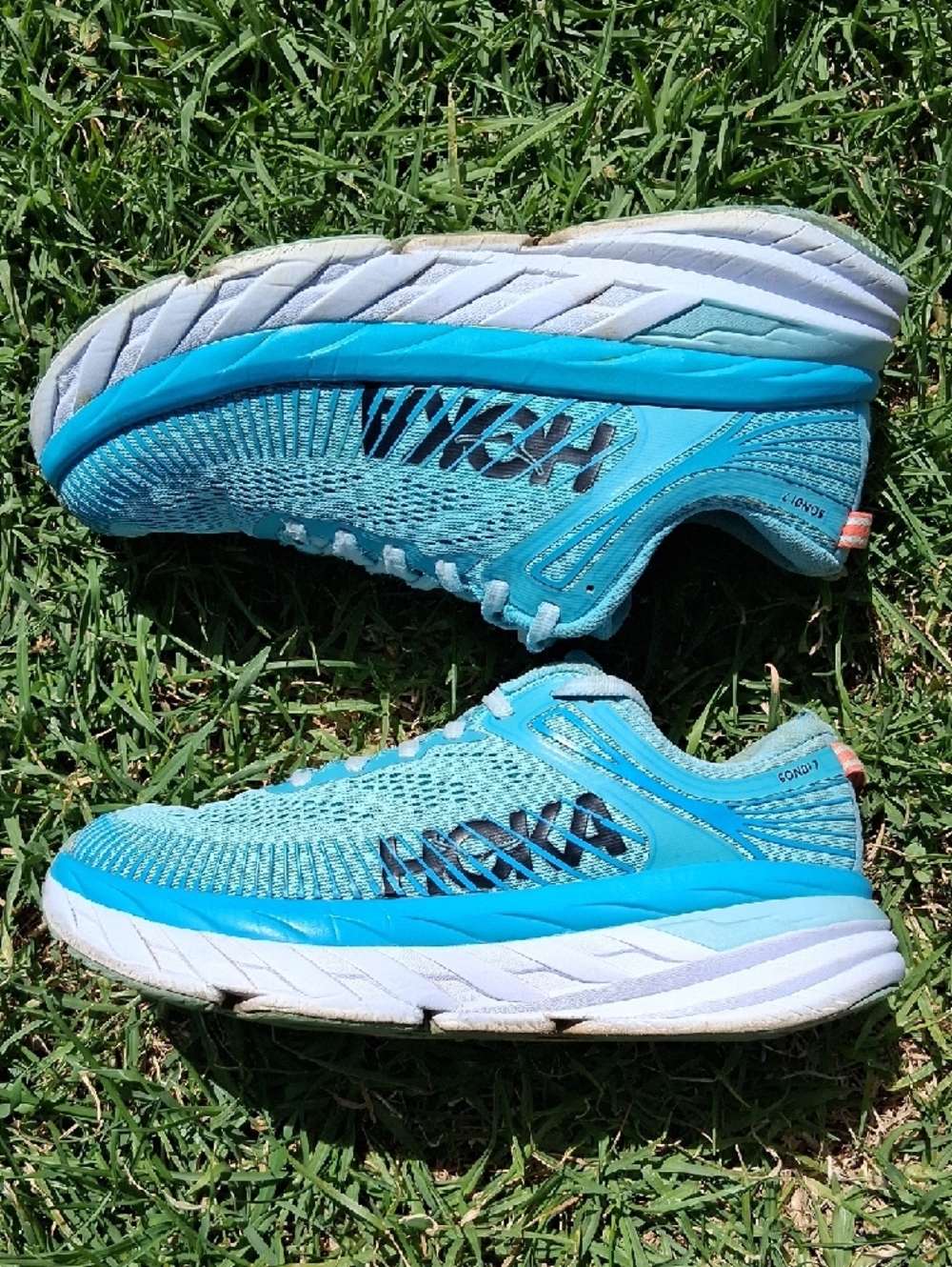 Hoka Bondi 7 turquoise and white running shoes